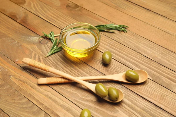 Bowl Olive Oil Spoons Wooden Background — Stock Photo, Image