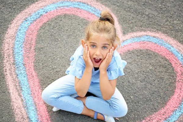 Little Girl Sitting Chalk Drawing Heart Outdoors — Stock Photo, Image