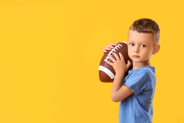 Niño Pequeño Con Pelota Rugby Sobre Fondo Color —  Fotos de Stock