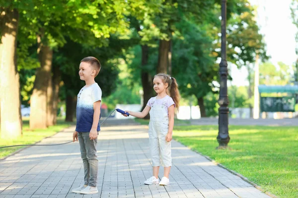 Cute Little Children Jumping Rope Outdoors — Stock Photo, Image