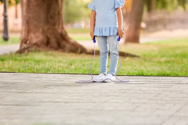 Cute Little Girl Jumping Rope Outdoors — Stock Photo, Image