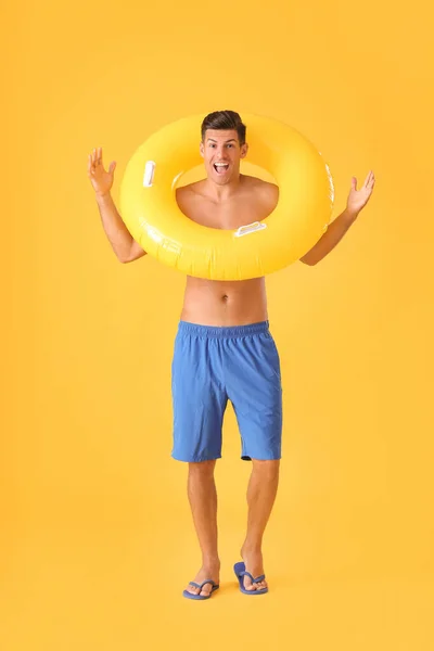 Happy Young Man Inflatable Ring Color Background — Stock Photo, Image