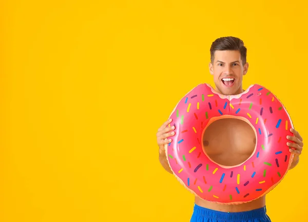 Happy Young Man Inflatable Ring Color Background — Stock Photo, Image