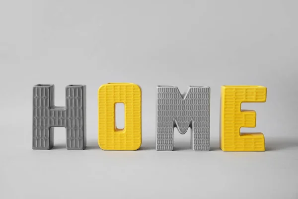 灰色の背景に単語の形の装飾 ホーム — ストック写真