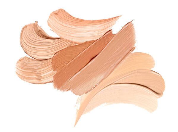 Samples of foundation for makeup on white background