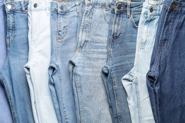 Muitos Jeans Elegantes Como Fundo — Fotografia de Stock