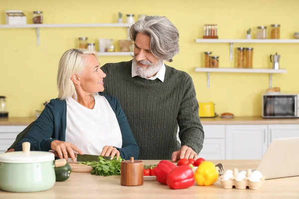 Mature Couple Cooking Together Home — Stock Photo, Image
