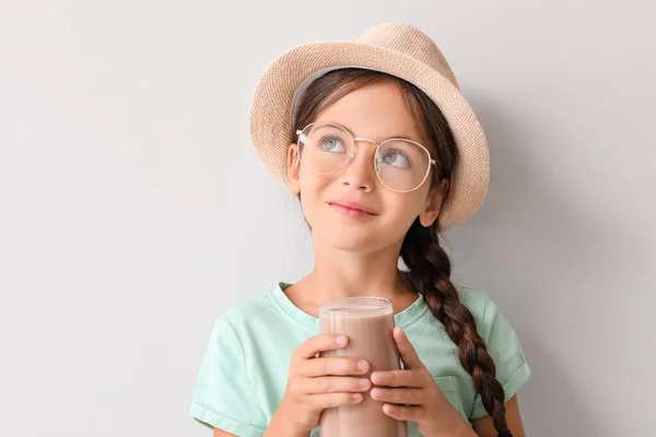 Little Girl Tasty Chocolate Milk Light Background — Stock Photo, Image