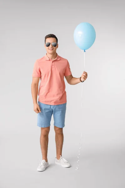 Young Man Balloon Grey Background — Stock Photo, Image