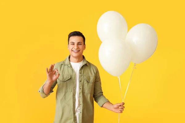 Young Man Balloons Showing Color Background — Stock Photo, Image