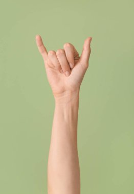 Renk arkaplanında Y harfi gösteriliyor. İşaret dili alfabesi