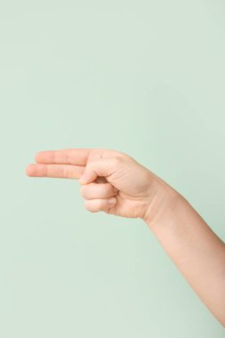 El, arka planda H harfini gösteriyor. İşaret dili alfabesi