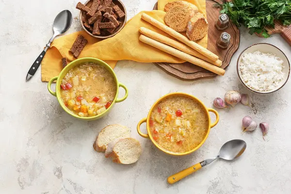 Pots Tasty Rice Soup Light Background — Stock Photo, Image