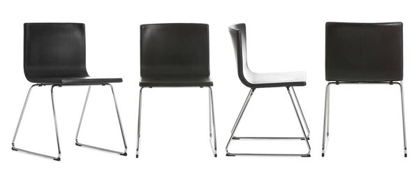 Set of modern black chairs on white background