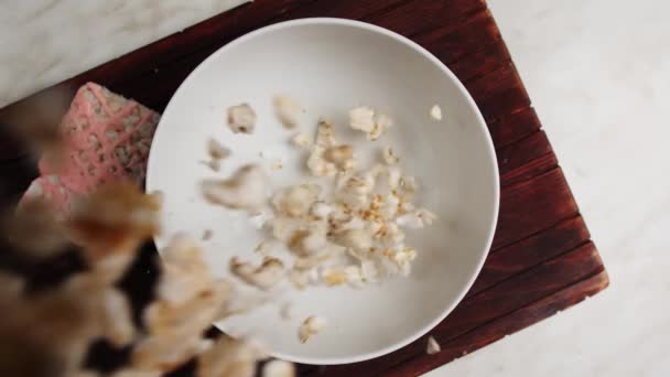 Falling Crispy Sweet Rice Bowl Table Top View — Stock Video