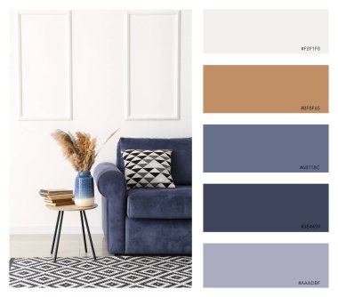 Masası ve kanepesi olan modern bir oda. Farklı renk desenleri