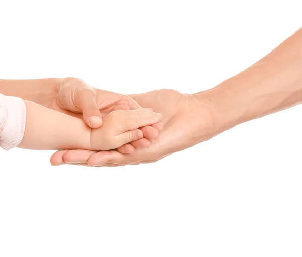 Hands of family on white background