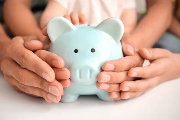 Family Piggy Bank Table — Stock Photo, Image