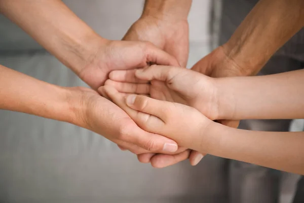 Family Holding Hands Together Home Closeup — Stock Photo, Image