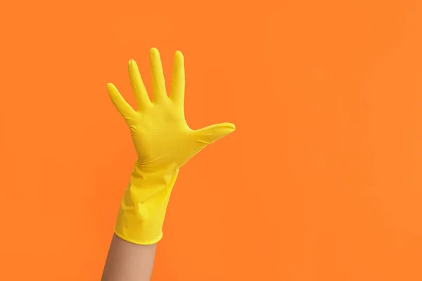Ręka Gumowej Rękawicy Tle Koloru — Zdjęcie stockowe