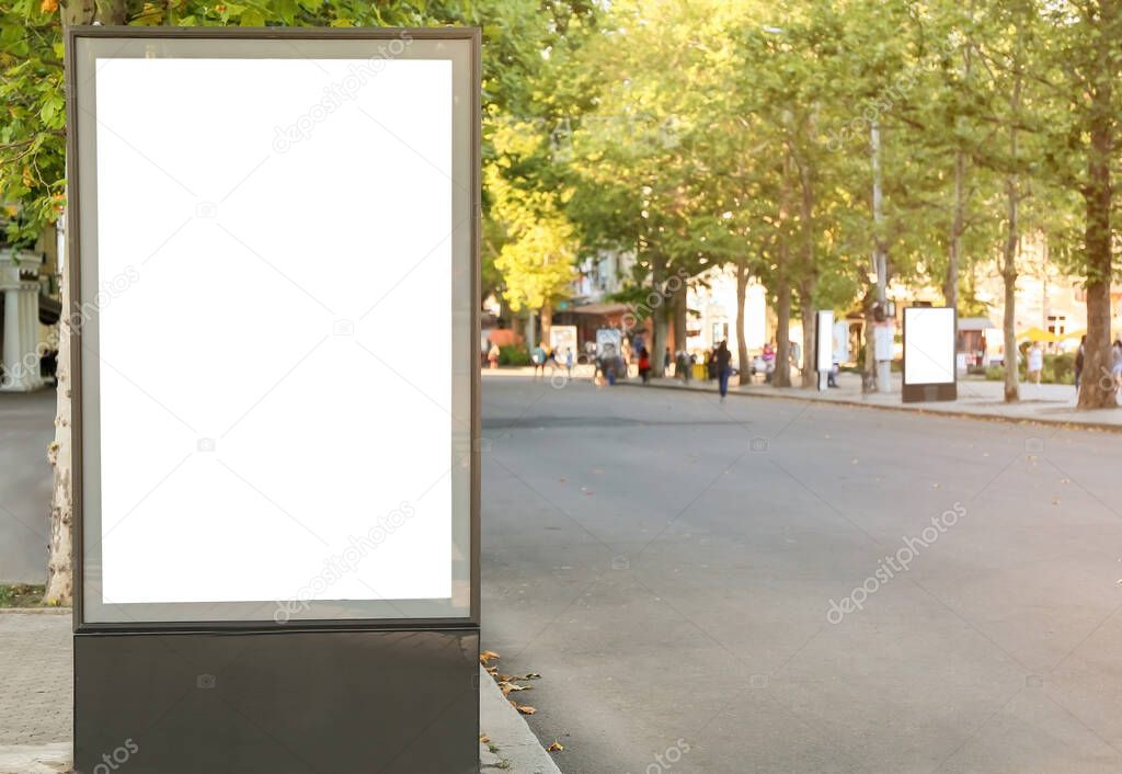 Blank advertising billboard on city street