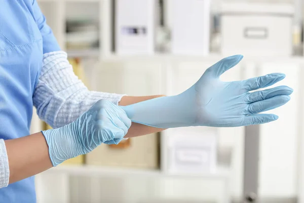 Doctor Putting Medical Gloves Clinic — Stock Photo, Image