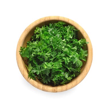 Beyaz arka planda kasede taze maydanoz