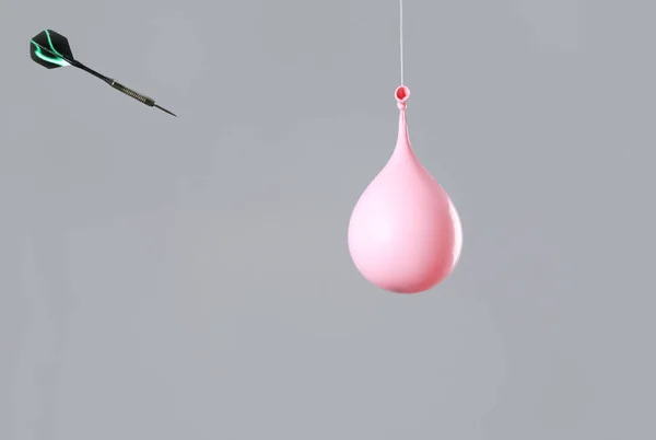Throwing Dart Balloon Water Grey Background — Stock Photo, Image