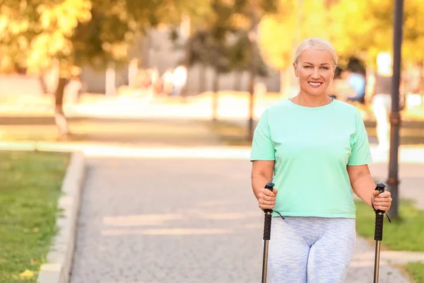 Mature Woman Walking Poles Outdoors — Stock Photo, Image