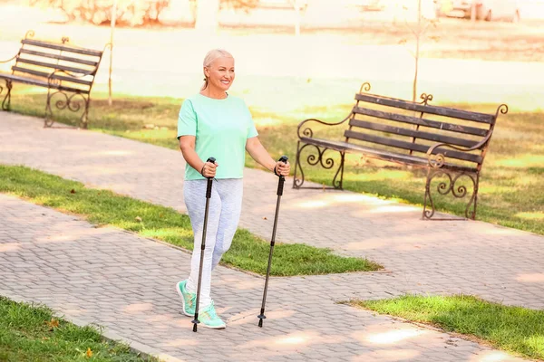 Mature Woman Walking Poles Outdoors — Stock Photo, Image