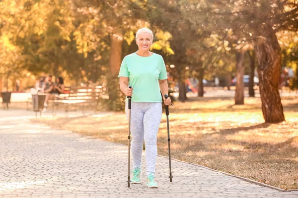 Mature Woman Walking Poles Outdoors — Stock Photo, Image