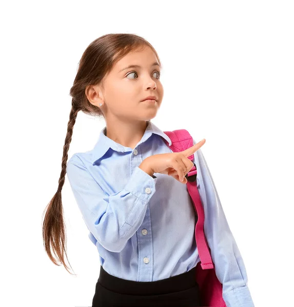 Pequena Estudante Apontando Para Algo Fundo Branco — Fotografia de Stock