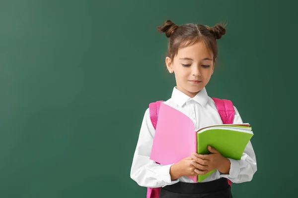 Little Schoolgirl Copybooks Color Background — Stock Photo, Image