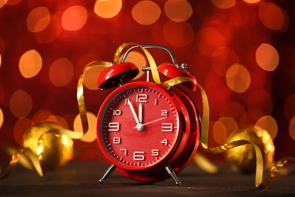 Alarm Clock Table Blurred Lights Christmas Time — Stock Photo, Image