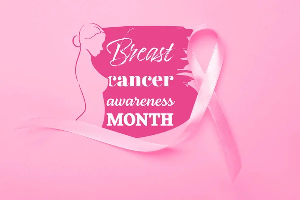Pinkfarbenes Band Mit Der Aufschrift Brustkrebsmonat Auf Farbigem Hintergrund — Stockfoto