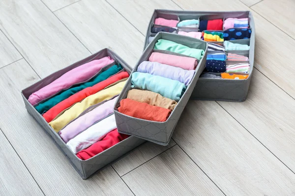 Organizers Clean Clothes Wooden Floor — Stock Photo, Image