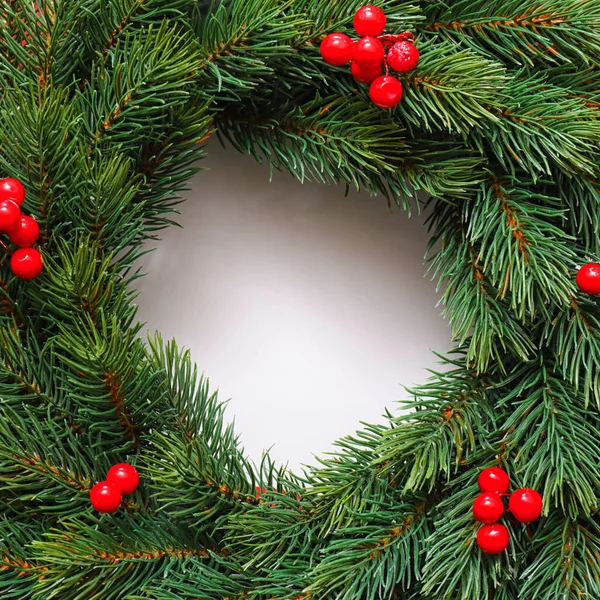 Beautiful Christmas wreath on white background, closeup