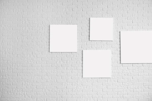 Different Blank Posters White Brick Background — Stock Photo, Image