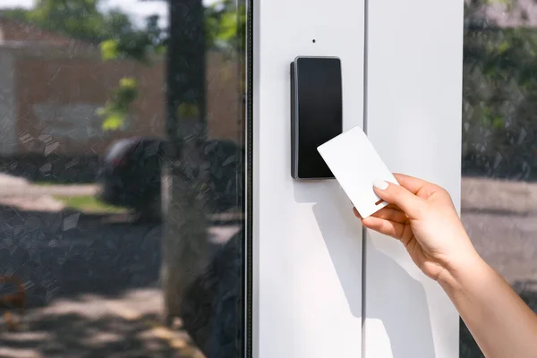 Woman Using Card Open Door Outdoors — Stock Photo, Image