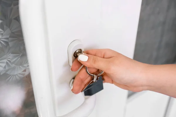 Woman Using Key Open Door Outdoors — Stock Photo, Image