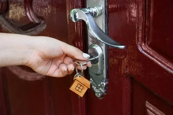 Woman Using Key Open Door Outdoors — Stock Photo, Image
