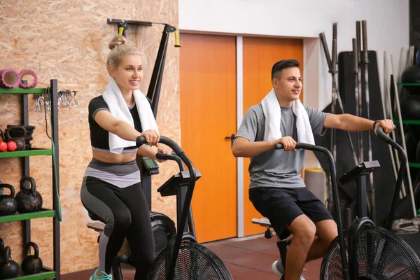 Young People Training Exercising Bike Gym — Stock Photo, Image