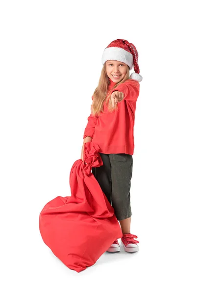 Cute Little Girl Santa Claus Bag Pointing Viewer White Background — Stock Photo, Image