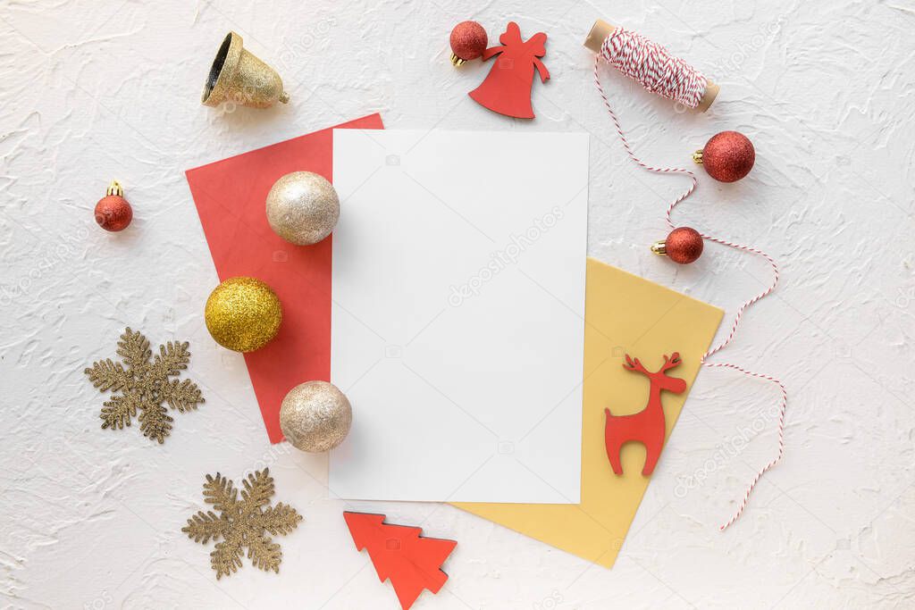 Beautiful Christmas decorations with empty card on white background