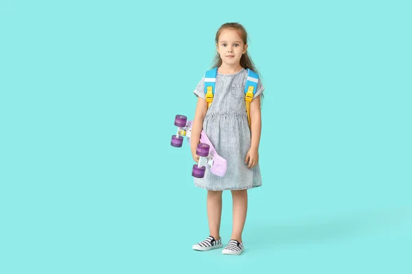Little Schoolgirl Skateboard Color Background — Stock Photo, Image