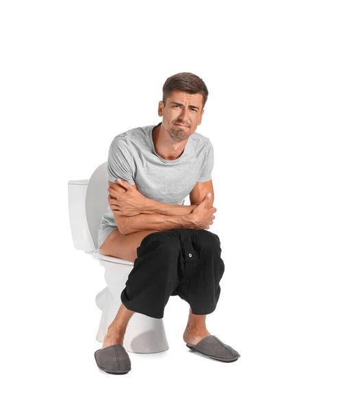 Άνθρωπος Πρόβλημα Συχνής Ούρησης Κάθεται Λεκάνη Τουαλέτας Λευκό Φόντο Συμπτώματα — Φωτογραφία Αρχείου