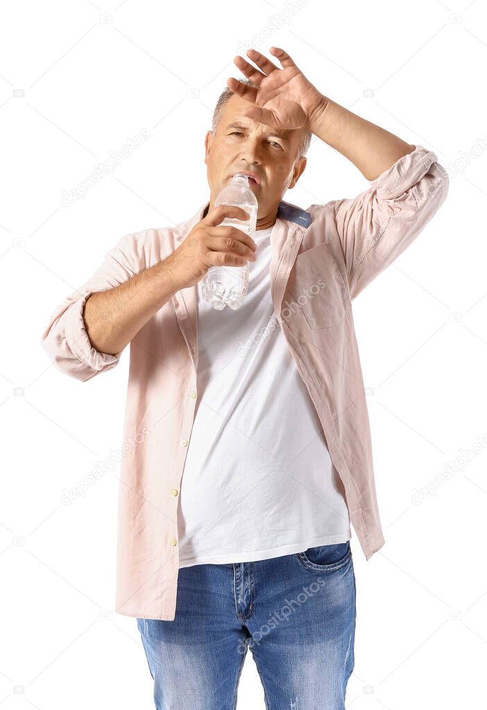 Mature man with problem of excessive thirst on white background. Diabetes symptoms