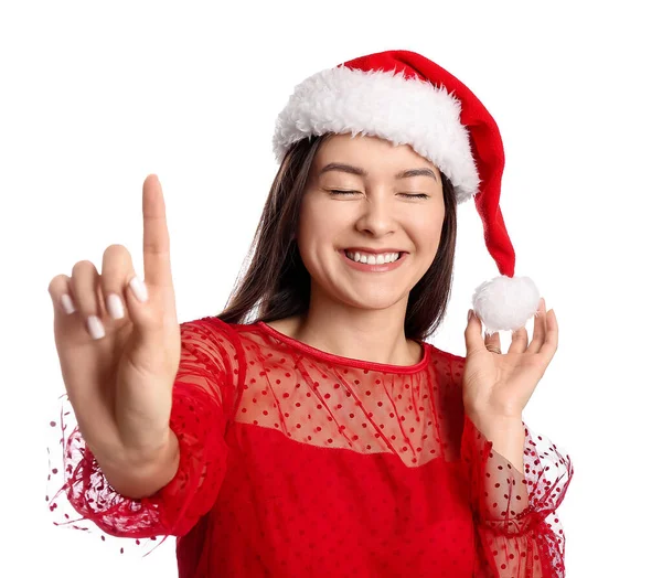 Happy Young Woman Santa Hat Showing Something White Background — Stock Photo, Image