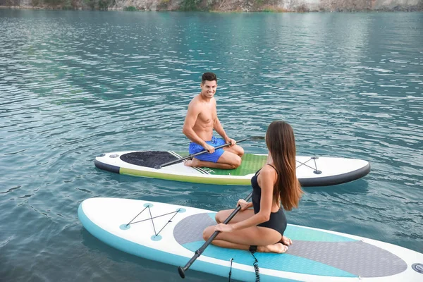 Young Couple Using Paddle Boards Sup Surfing River — Stock Photo, Image