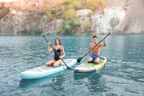 Young Couple Using Paddle Boards Sup Surfing River — Stock Photo, Image